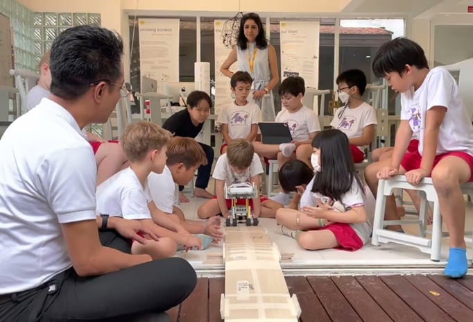 Year 3 students testing the prototype of their AQI robot
