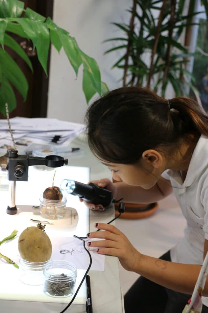 ELC student participating in hands-on experimental learning