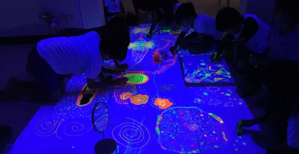 Student engaged in art activity under the Reggio Emilia approach at ELC